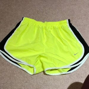 Yellow Nike shorts